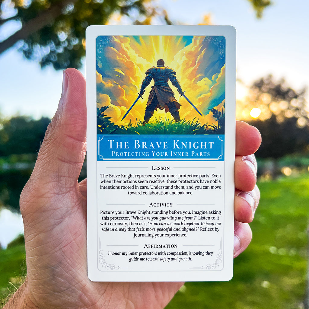 A person holding "The Brave Knight" card from Hero's Ascent outdoors.